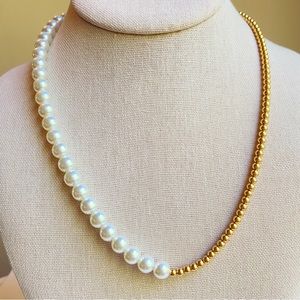Half faux pearls and half goldtone metal beads on a chain strung necklace